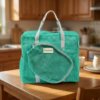 turquoise sports carry bag with multi compartments